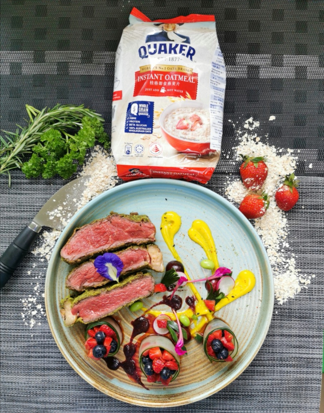 Quaker Oats Herb crusted Ribeye steak with Japanese pumpkin puree, served with balsamic honey infused Strawberries and blueberries, Cherry red wine sauce